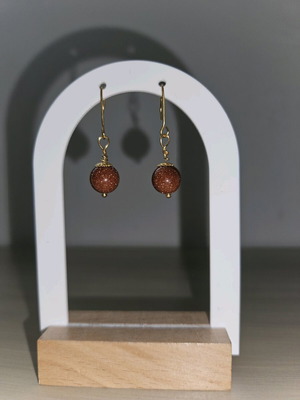 Handmade dangle earrings with goldstone