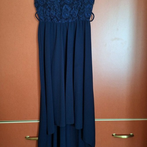 Sleeveless dress like new with back design, size L