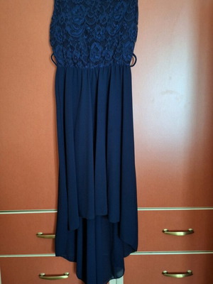 Sleeveless dress like new with back design, size L
