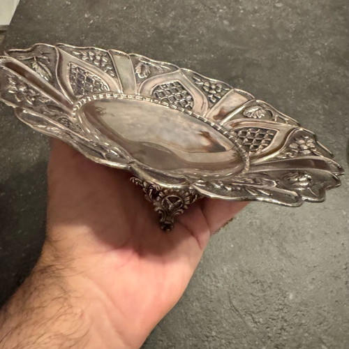 Vintage bowl with silver lining and engraved design, used