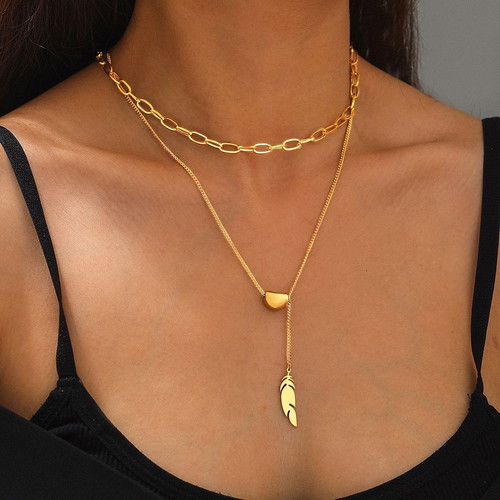 Feather necklace in gold color new stainless steel