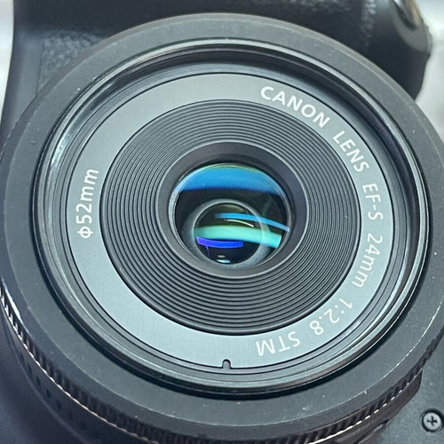 Canon 700D used with two lenses 18-55 and 24mm, two batteries