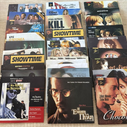 Pack of 30 DVDs with various movies