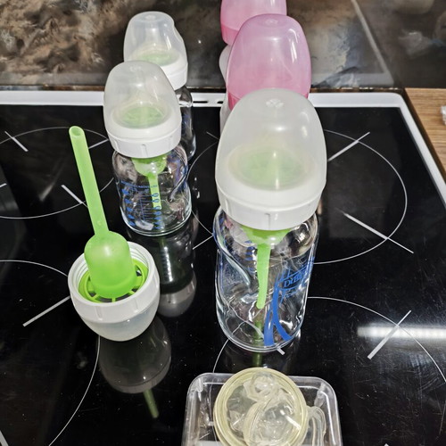 Dr Brown's baby bottles set of 5 like new with extra accessories
