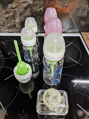 Dr Brown's baby bottles set of 5 like new with extra accessories