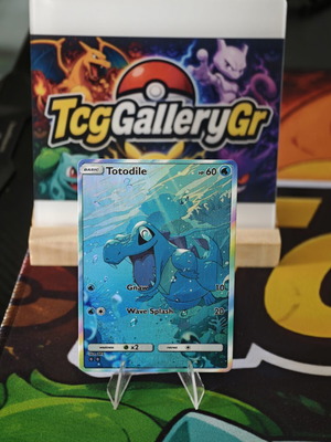 Totodile Water Art Pokemon Card in excellent condition