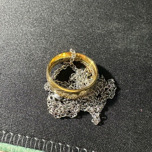 Lord of the Rings ring with chain like new, gold and silver
