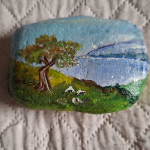 Hand-painted stone with landscape