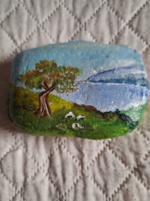 Hand-painted stone with landscape