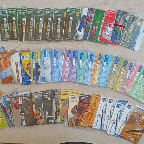 Phone cards pack of 128 sealed, all different