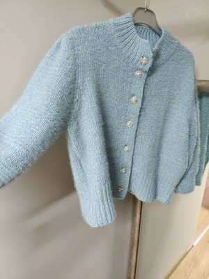 Milkwhite knitted blue mohair sweater like new with decorative buttons