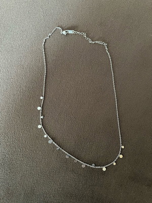 Steel chain like new, thin with silver details