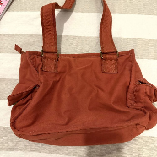 Shoulder bag in warm terracotta color like new