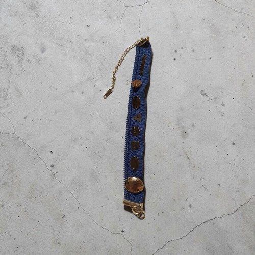 Handmade bracelet with zipper beads and chain extension
