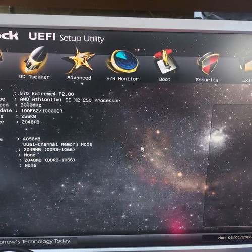 AsRock 970 Extreme4 AM3+ motherboard used, functional with updated BIOS