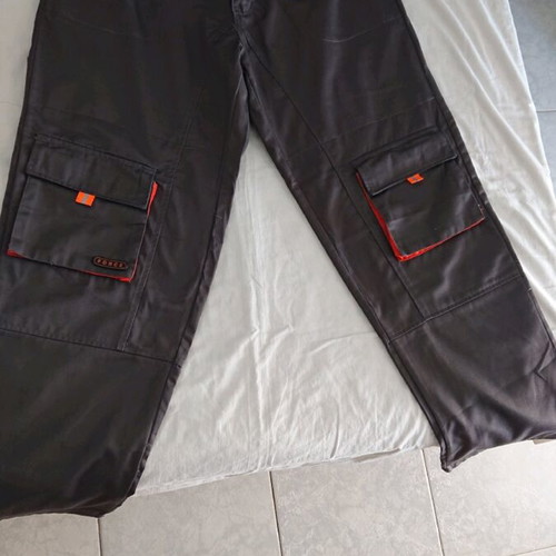 Worksite jacket and trousers set new with multiple pockets and reflective details