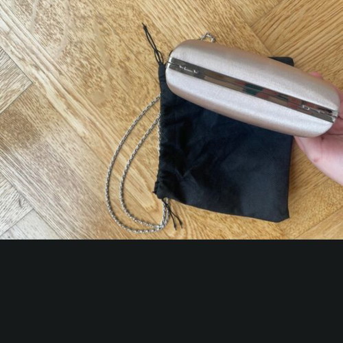 Satin clutch bag with chain strap