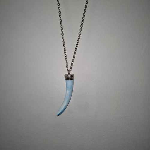 Long necklace used with elephant tooth design in white and turquoise