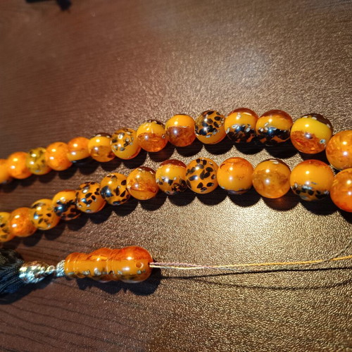 Komboloi worry beads with 33 saffron-colored beads and silk tassel
