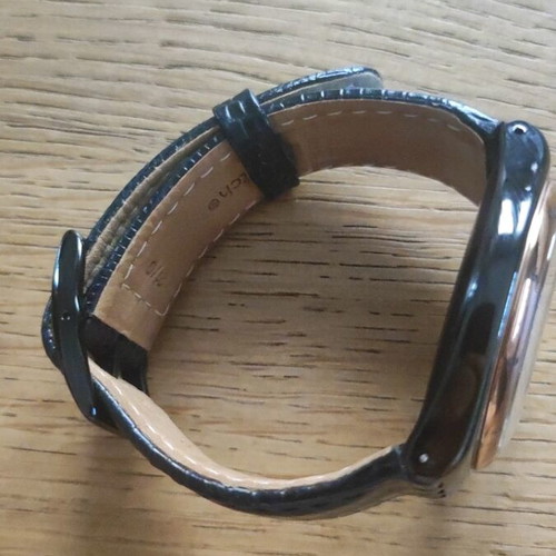 Swatch Black Nachtigall wristwatch YWB403, black dial with rose gold accents