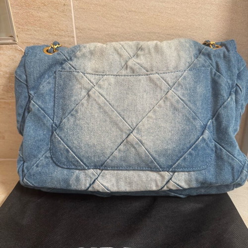 Denim shoulder bag like new with bronze details