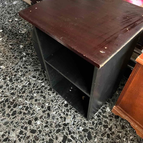Wooden black shelf used with minor wear