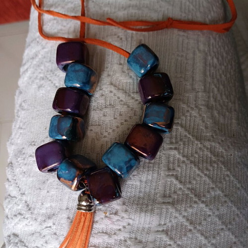 Necklace new from leather and ceramic beads