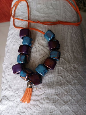 Necklace new from leather and ceramic beads