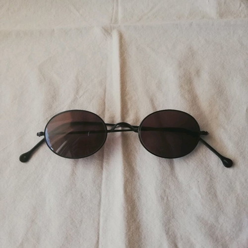 Oliver Peoples sunglasses used, black metal frame