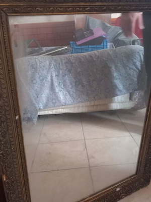 Mirror with wooden gold carved frame used, with damages