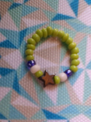 Elastic ring with beads and hematite star, like new
