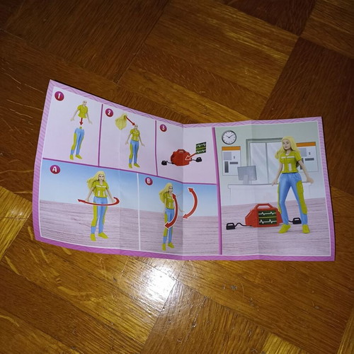 Barbies plastic figure new with suitcase