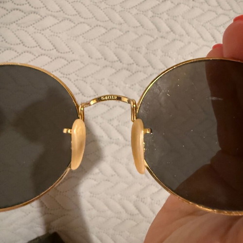 Ray-Ban Oval sunglasses used with gold frame and gray lenses
