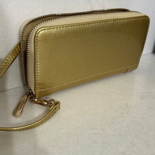 Two gold wallets, one with wrist strap