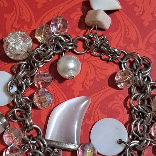 Metal bracelet with shells and glass beads like new, white and silver