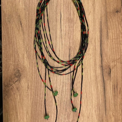 Collection of 10 used faux hanging necklaces