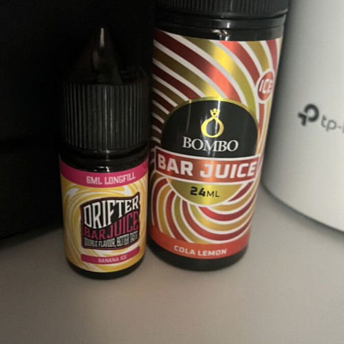 OXVA NeXLim Go vape device like new with 50ml cola lemon and 30ml banana ice