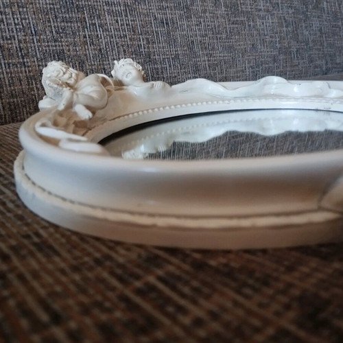Vintage mirror with angels used, white-beige resin-like material