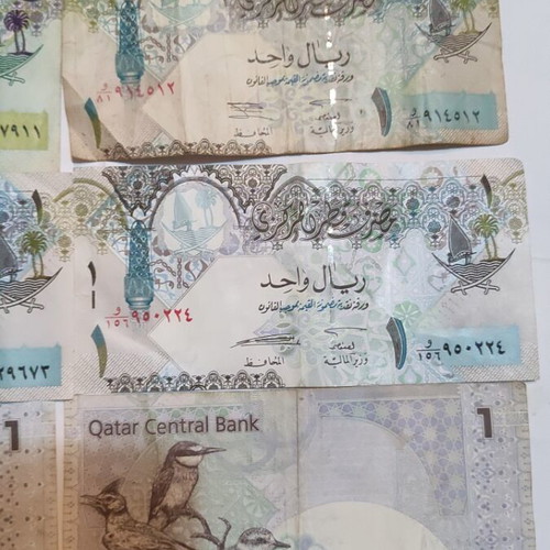 Qatar banknotes 5 pieces, one 5 Riyal and four 1 Riyal, mostly like new