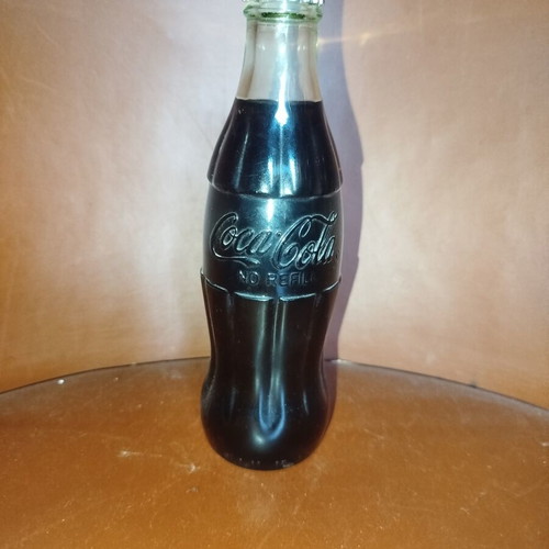 Coca-Cola collectible glass bottle like new from 70s-80s with original cap