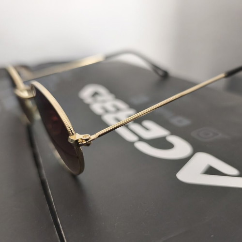 Ray Ban oval sunglasses like new, gold frame, gradient brown lenses