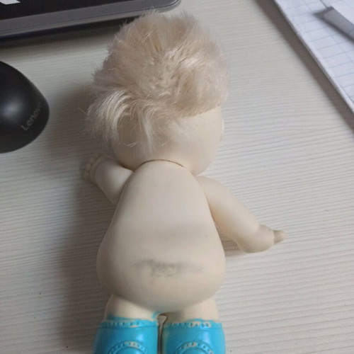 Plastic vintage doll used, collectible with hair