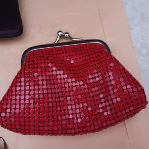 Wallets used, small, multicolored, with non-working zippers