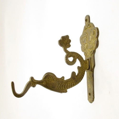 Vintage brass wall hook with mythical sea creature, like new