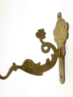 Vintage brass wall hook with mythical sea creature, like new