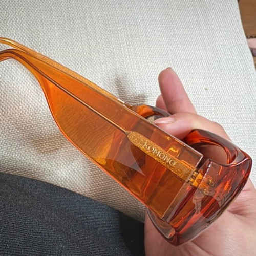 Komono sunglasses like new, orange with case and cloth