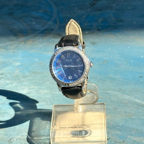 Vintage Pearl wristwatch with blue dial and stones