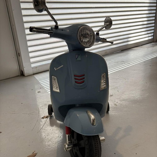 Electric kids Vespa ride-on toy