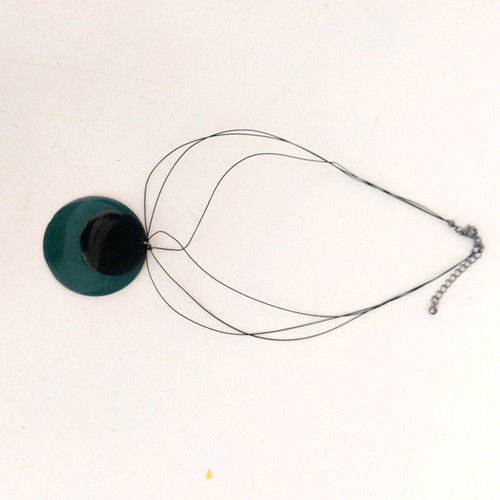 Women's necklace used with thin cord and cypress black detail