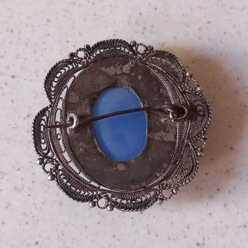 Filigree pin used, vintage 1950s–60s design